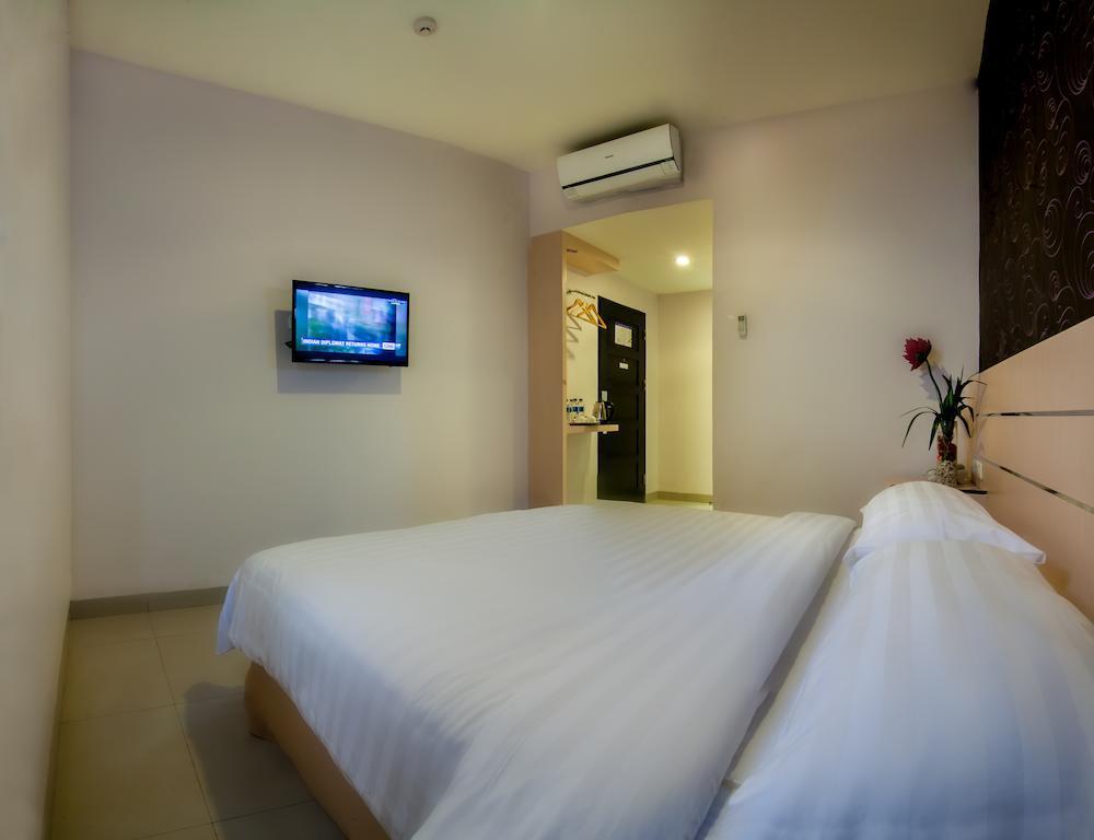 Cordela Hotel Medan Extérieur photo